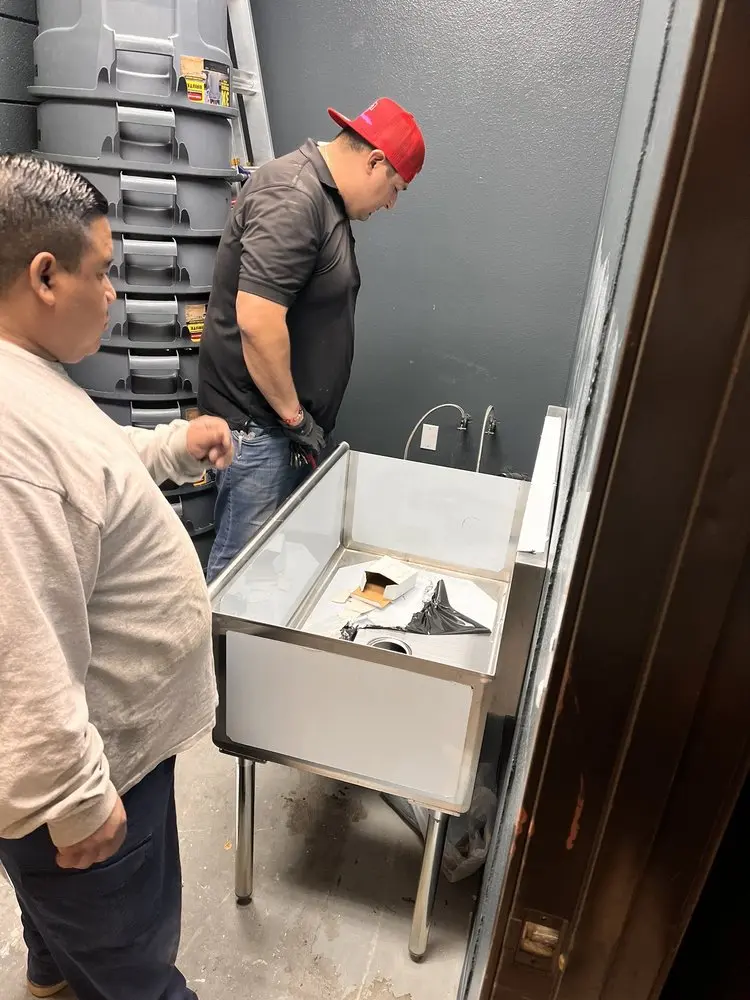 Commercial plumbing and sink installation in Tully